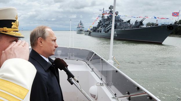 El presidente Vladimir Putin impulsó el gasto militar y acusó a la OTAN de tratar de debilitar a su país. El presidente Vladimir Putin impulsó el gasto militar y acusó a la OTAN de tratar de debilitar a su país.