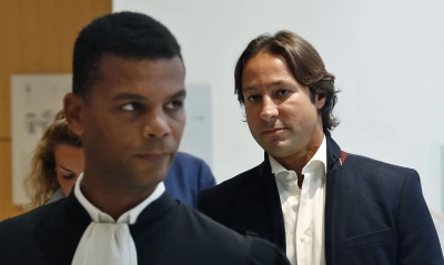 Rani Saida (derecha) en el juicio con su abogado