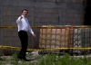 El titular de la Segob, Miguel Ángel Osorio Chong, en el predio donde se encontró la salida del túnel por donde supuestamente escapó Guzmán Loera.