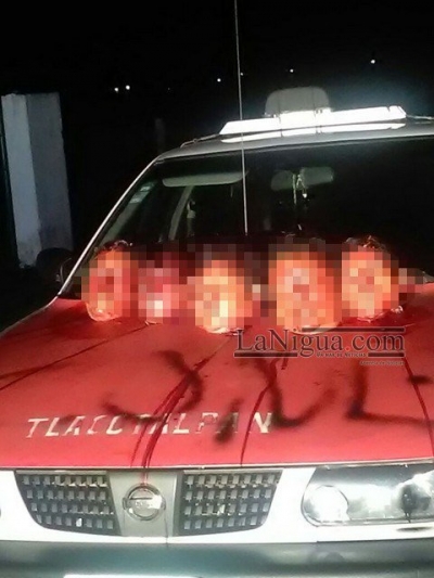 Hallan cinco cabezas en el cofre de un taxi en Veracruz