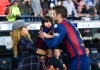 Piqué y Shakira junto a su hijo Milan en 2014.
