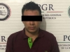 Al detenido se le aseguró un arma larga y 117 envoltorios con cocaína