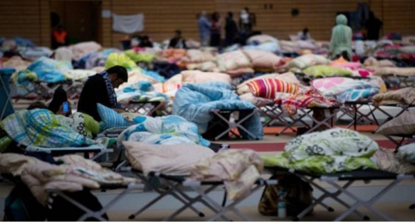 Refugiados en un centro de acogida en Berlín, en 2015.